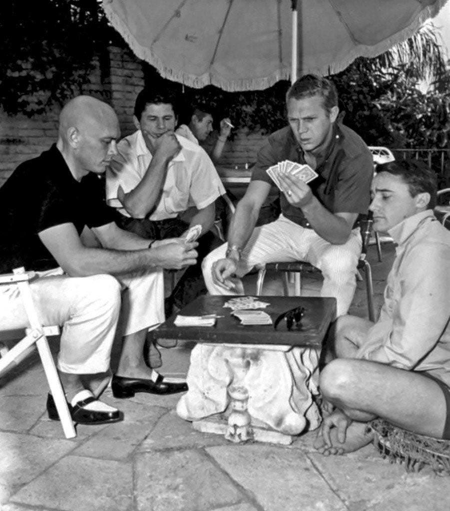 Yul Brynner, Charles Bronson, James Coburn, Steve McQueen and Robert Vaughn taking a break from working on The Magnificent Seven - 1960
